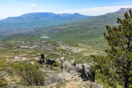 View of the Chatyr-Dag plateau from the top of the Demerdzhi mountain range in Crimea.の写真素材