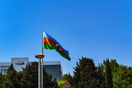 The flag of Azerbaijan on the street in Baku. Azerbaijan - May 2019のeditorial素材