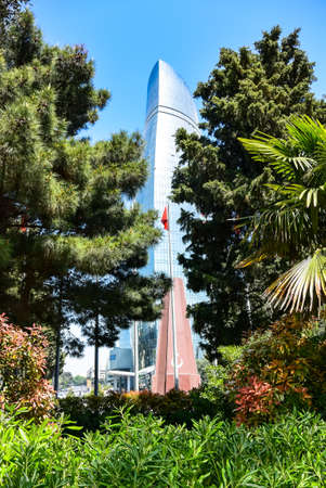 BAKU, May 2019: Flame Tower Hotel, the largest building in the capital of Azerbaijan. Streets of Baku.のeditorial素材