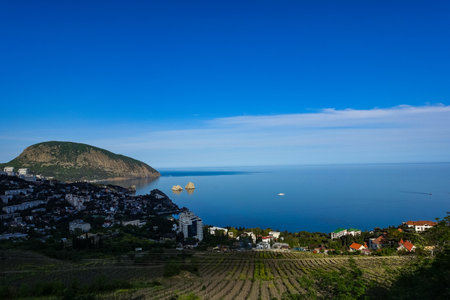 View of the Ayu-Dag mountain and the city of Gurzuf from the observation deck. Crimean Mountains. May. 2021. Crimea. Russia. The Crimean Peninsula.の写真素材