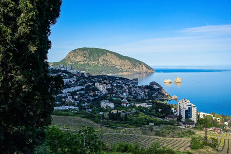 View of the Ayu-Dag mountain and the city of Gurzuf from the observation deck. Crimean Mountains. May. 2021. Crimea. Russia. The Crimean Peninsula.の写真素材