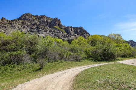 Ancient limestone high mountains in the air haze. The Valley of Ghosts. Demerji. Crimea. Russia 2021の写真素材