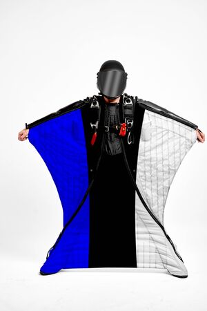 Estonia extreme. Men in wing suit templet. Skydiving men in parashute. Simulator of free fall.の写真素材