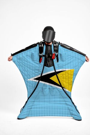 Saint Lucia extreme. Men in wing suit templet. Skydiving men in parashute. Simulator of free fall.の写真素材