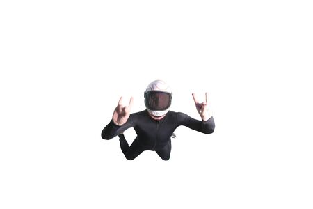 Two fingers. Fly men shows two fingers. Sky diver gestures by fingers. Teampleat skydiver.の写真素材