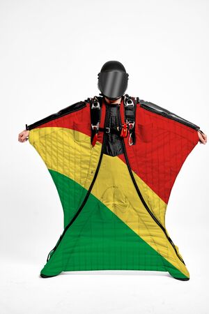 Congo extreme. Men in wing suit templet. Skydiving men in parashute. Simulator of free fall.の写真素材