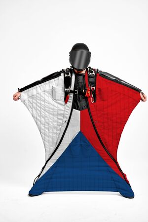 Chech extreme. Men in wing suit templet. Skydiving men in parashute. Simulator of free fall.の写真素材