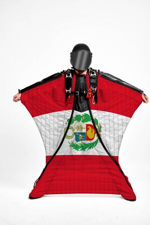 Peru extreme. Men in wing suit templet. Skydiving men in parashute. Simulator of free fall.の写真素材