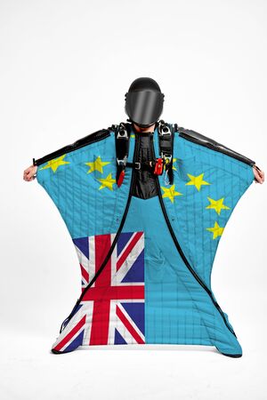 Tuvalu extreme. Men in wing suit templet. Skydiving men in parashute. Simulator of free fall.の写真素材