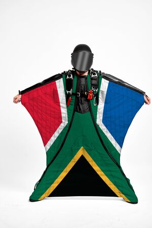 South Africa extreme. Men in wing suit templet. Skydiving men in parashute. Simulator of free fall.の写真素材