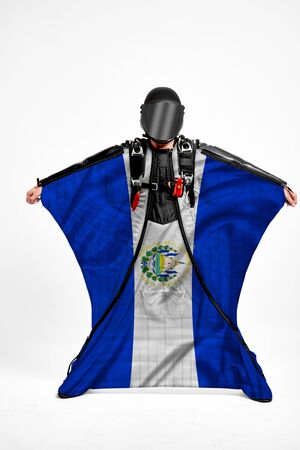 Salvador extreme. Men in wing suit templet. Skydiving men in parashute. Simulator of free fall.の写真素材