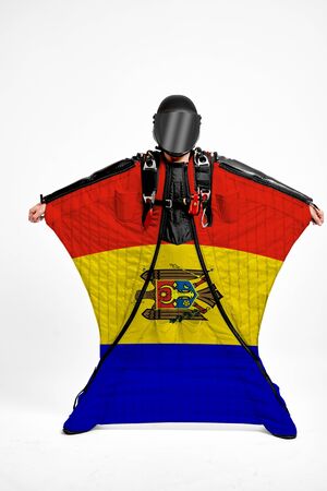 Moldova extreme. Men in wing suit templet. Skydiving men in parashute. Simulator of free fall.の写真素材