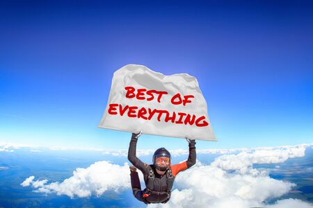 Best of everything. Flag in skydiving. People in free fall.Teampleat skydiver. Extreme sport.の写真素材