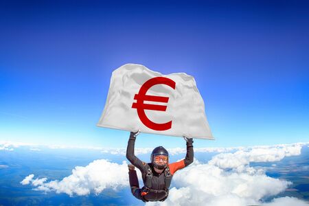 Euro. Flag in skydiving. People in free fall.Teampleat skydiver. Extreme sport.の写真素材