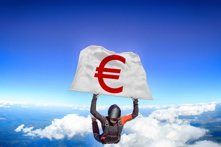 Euro. Flag in skydiving. People in free fall.Teampleat skydiver. Extreme sport.の写真素材