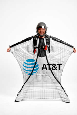AT and T. Bird men. Men in wing suit equipment.Demonstration of popular brands. Simulator of free fall.のeditorial素材