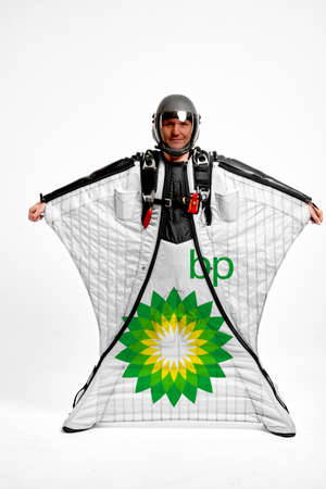 BP. Bird men. Men in wing suit equipment.Demonstration of popular brands. Simulator of free fall.のeditorial素材