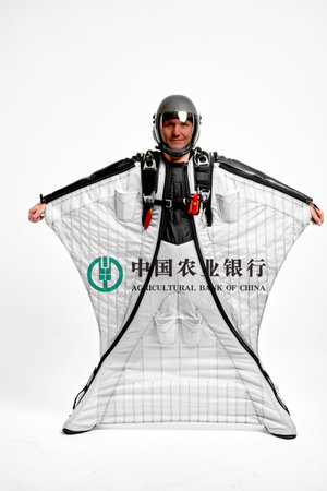 Agri Bk China. Bird men. Men in wing suit equipment.Demonstration of popular brands. Simulator of free fall.のeditorial素材