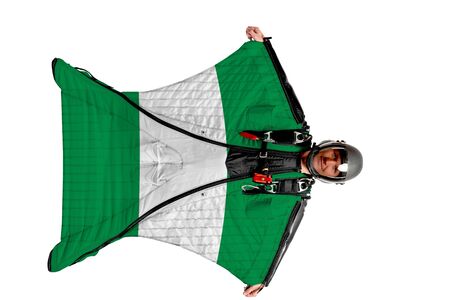 Panama flag. Men in wing suit templet. Skydiving men in parashute. Simulator of free fall.の写真素材