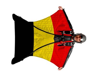 Panama flag. Men in wing suit templet. Skydiving men in parashute. Simulator of free fall.の写真素材