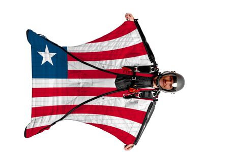 Panama flag. Men in wing suit templet. Skydiving men in parashute. Simulator of free fall.の写真素材