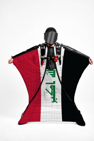 Iraq extreme. Men in wing suit templet. Skydiving men in parashute. Simulator of free fall.の写真素材