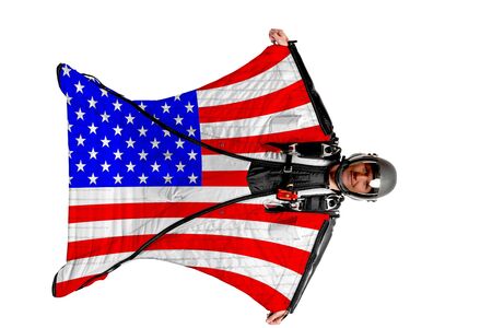 USA flag. Men in wing suit templet. Skydiving men in parashute. Simulator of free fall.の写真素材