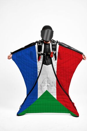 Sudan extreme. Men in wing suit templet. Skydiving men in parashute. Simulator of free fall.の写真素材