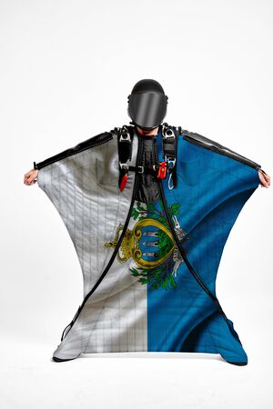 San Marino extreme. Men in wing suit templet. Skydiving men in parashute. Simulator of free fall.の写真素材