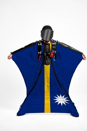 Nauru extreme. Men in wing suit templet. Skydiving men in parashute. Simulator of free fall.の写真素材