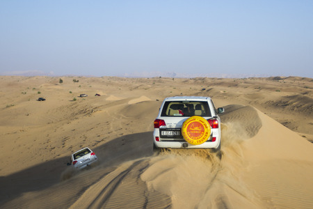 Dubai, UAE - October 30 - Desert safari, also called dune bashing, in DUBAI, UAE on October 30, 2013  Desert safari is a popular activity among tourists in Dubai のeditorial素材