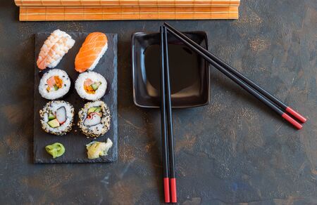 Oriental Japanese food based on sushi, maki, nigiri, unagi, wasabi, rice and fresh fishの写真素材
