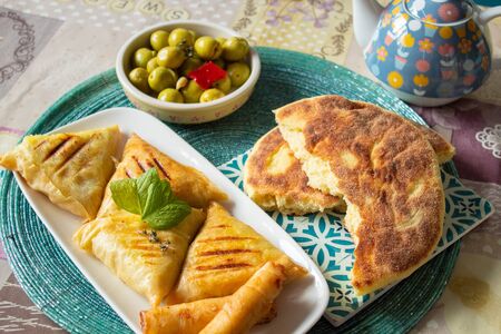 Arab chicken briwats on white plateの写真素材