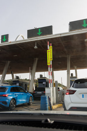 Highway toll from inside the car.
