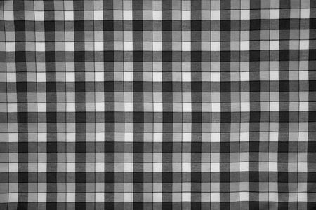 detail of fabric print with black and white grid
