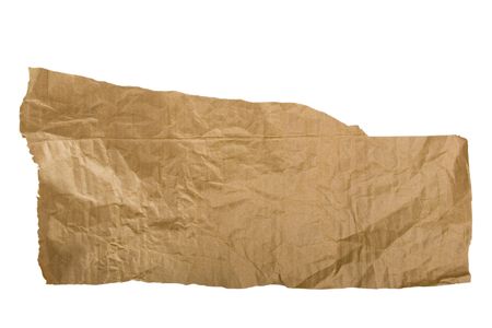 Piece of brown paper, torn on white backgroundの写真素材