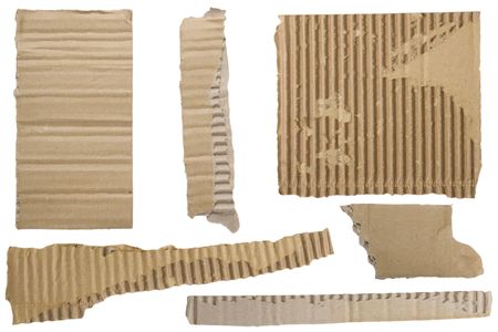 Pieces of torn brown corrugated cardboard, Isolated on White Backgroundの写真素材