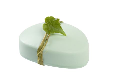 green soap with leaf on white backgroundの写真素材