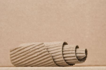 close-up of spiral made from brown cardboardの写真素材