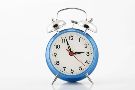 blue alarm-clock with silver bell on white background