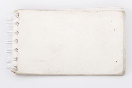 front view of old notebook on white backgroundの写真素材