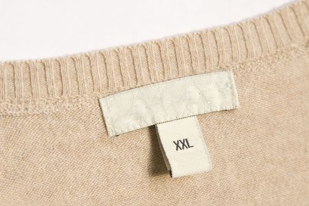 close-up of clothing label with xxl size
