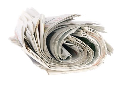 Roll of newspapers, isolated on white background の写真素材