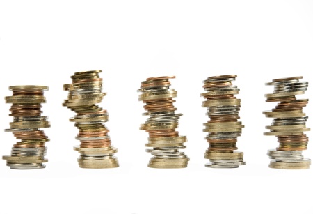 many money coins stacked up on a white background