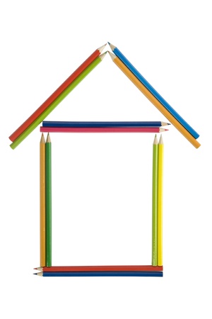 house made from colour pencils on a white backgroundの写真素材