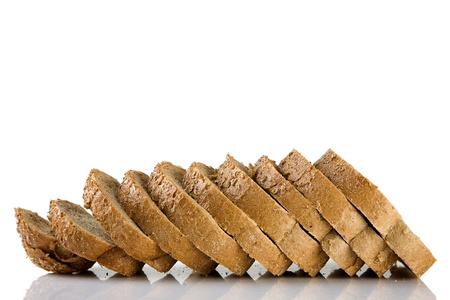 Sliced brown bread Isolated on a white background, healthy food conceptの写真素材