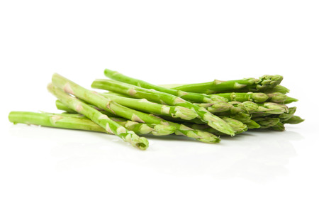 Green and fresh Asparagus Bundle on White Backgroundの写真素材