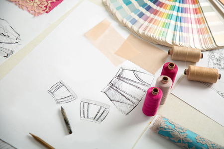 fashion designers, working in progress on tailor tableの写真素材