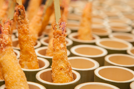 Shrimp Tempura with Chopsticks in bamboo potの写真素材