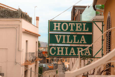 Hotel Villa Chiara Sign of a B&B with cityview and partial blue skyのeditorial素材
